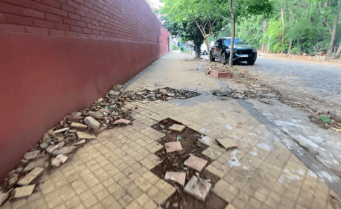 Crumbling sidewalk in Villa Morra, Asunción