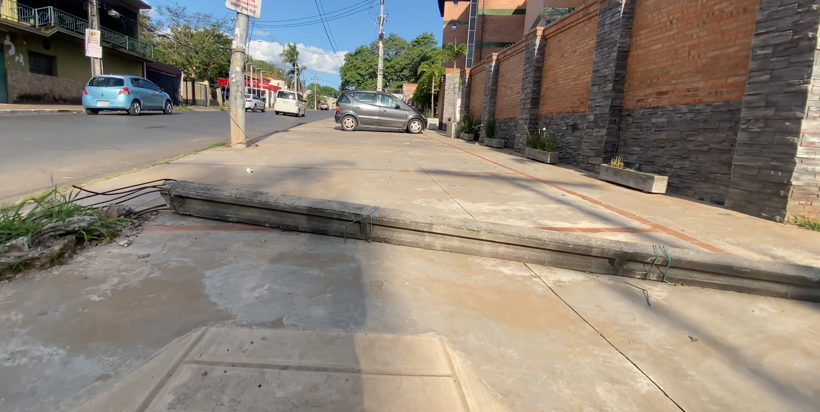 Fallen Telephone Pole on Asunción Sidewalk